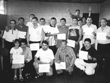 Rev. Ramon Ramirez (far left) with his theology class at a prison in El Salvador.