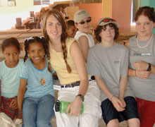 Shanna Bush, Jen Muir, Harrison Smith, and Nicki Waines from St. Paul's with two new friends at Escuela Joyas de Cristo in Hainamosa, Dominican Republic. Photos by Malcolm Smith