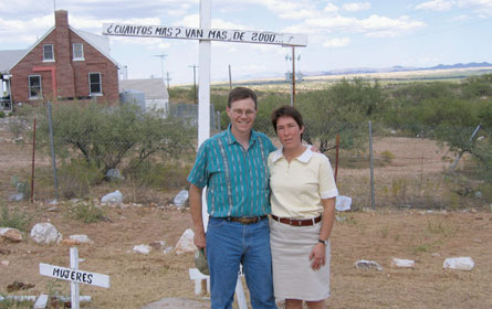 Jean Morris and Rick Ufford-Chase, Moderator of the 216th General Assembly of the Presbyterian Church (USA), at the Mexican/US border where a monument has been erected in memory of migrants who died in the desert trying to cross the border.