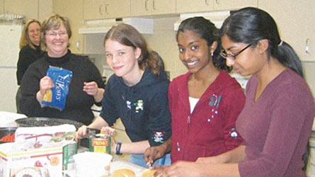 The Thornhill youth group prepares food for a community dinner at Toronto's Evangel Hall.