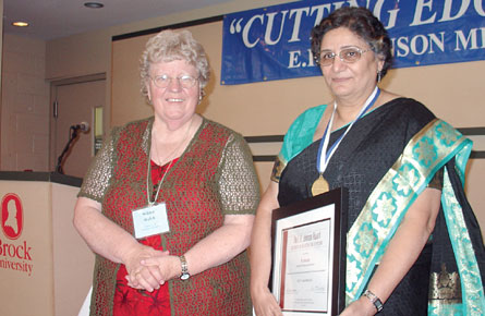 Moderator Wilma Welsh with E. H. Johnson Award recipient Karuna Roy of the Church of North India at General Assembly.