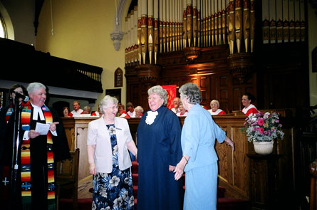 The congregation of Knox, Guelph presenting gown and 'Moderator's lace' to Wilma Welsh (her home church). From left, Rev. Thomas Kay, Jessie Bush (session clerk), Welsh and Vera Teasdale (former session clerk).