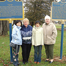 Visitors from Taiwan visiting the historical plaques honouring the first missionary to Taiwan, Rev. Dr. George Leslie Mackay at Embro, Ont. Ni-Ling Lin, Wilma Welsh, Ibu Kanbudan and Pauline Lindsay. Photo - Alexis McKeown