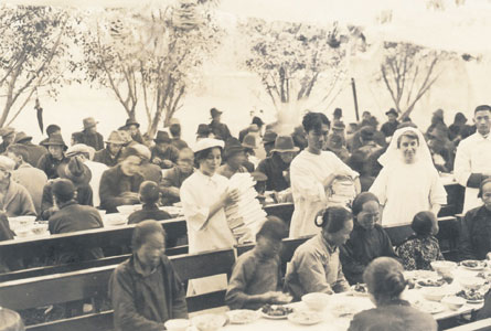 Mrs. Gushue-Taylor serving Christmas dinner at MacKay Memorial Hospital, Taiwan, 1926. Photo - PCC Archives