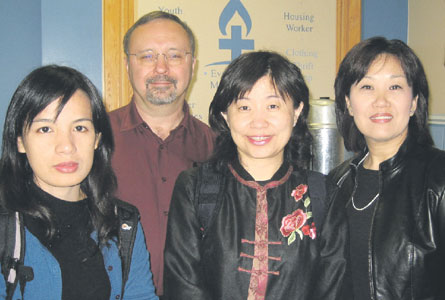 Rev. Ibu Kanbudan and Rev. Lin Ni-Ling of Taiwan visited Evangel Hall along with Rev. Sarah Kim (WMS). They are pictured with the hall's director, Joe Taylor. Photo - courtesy of the WMS