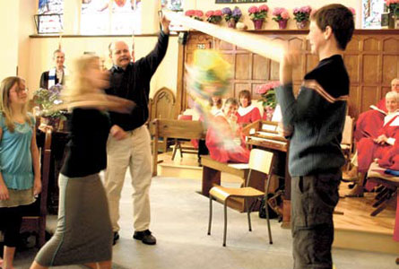 Sin takes a whacking, at Knox, Dunnville, Ont. Rev. Geoff Johnston explains: "In Mexico at Christmas time they make a pinata representing the seven deadly sins, which the children duly break open. I thought that a good idea for Easter as well. At the end of the service the Sunday School lined up to take their turn at whacking sin. When the pinata broke all sorts of candies spilled out on to the floor; the kids collected them and two of them stood at the door, handing out a taste of salvation to the congregation as they went home to lunch."