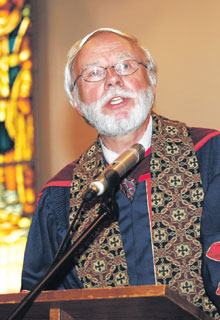 The Moderator, Rev. J. H. (Hans) Kouwenberg speaks at opening worship. Photo - David Harris