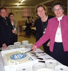 You can't party enough when celebrating your centenary. The Order of Diaconal Ministries cracked open the cake at the Atlantic Synod in October. At the cake are Rev. Shirley F. Murdock and Rev. Cheryl MacFadyen. Looking on are Synod moderator Rev. Dr. John Crawford and Rev. Bonnie Wynn of New Brunswick. Look for more Diaconal centenary news next month.