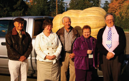 Pictured in front of the world's largest pumpkin (697 kilograms) grown by Jake VanKooten (a member of Assembly Council) and an elder at Knox, Port Alberni, are from left to right, clerk of synod Rev. Bob Sparks, Knox minister Rev. Laura Hargrove, Van Kooten, moderator of the synod Mrs. Maxine Balsdon and the retiring clerk of synod Rev. Herb Hilder.