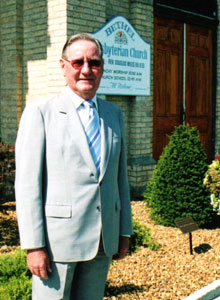 Two memorial gifs were recently dedicated at Bethel, Dederton, Ont. One, a memorial garden in memory of Helen McNaughton. Her husband Jim is seen pictured in the garden. And, in memory of Peter McNaughton, twelve apostolic shields, carved by Bethel members Wayne Kennedy and Rick Smith. Pictured below the shields are the McNaughtons: Suzanne, Debbie, David, Irene, Donald and Kathy Fulton.