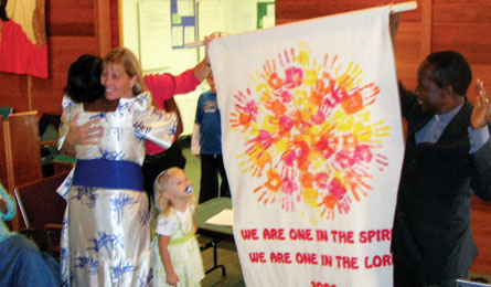The Sunday school presents a banner, photo by Peter Kennedy