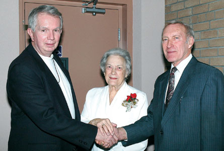 Meeting the Needs: Albion Gardens, Ont., dedicated their new elevator in December on their anniversary Sunday. Dorothy Hopper and Bob Woodcock were the fi rst to use this new conveyance. Rev. Ron Van Auken greeted them at their destination. A more accessible building allows others to join in worship.