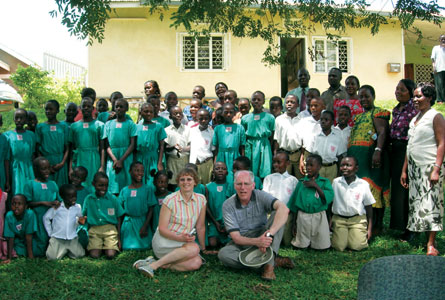 Joyce Lock and Peter Kennedy from St Cuthbert's with some of the children and caregivers in front of St Stephen's Hospital, photo by Peter Kennedy