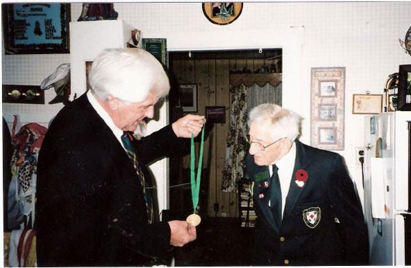 George Brimicombe, senior elder in St. Andrew's, Westville, Nova Scotia, was presented with a Democracy 250 medal by MLA Clarrie Mac Kinnon for his service to our country in the Second World War. These medals were presented on behalf of the Government of Nova Scotia, as they celebrated Canada’s First Parliamentary Democracy in Canada (1758-2008).