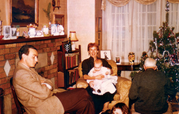 Christmas 1957 with Dad, Mum, baby sister, grandfather’s back and the top of my six-year-old head.