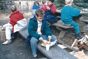 Spouse as a young cub, eating camp food
