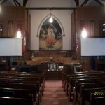 The Sanctuary The Sanctuary. Note the twin screens for A/V projection during worship.
